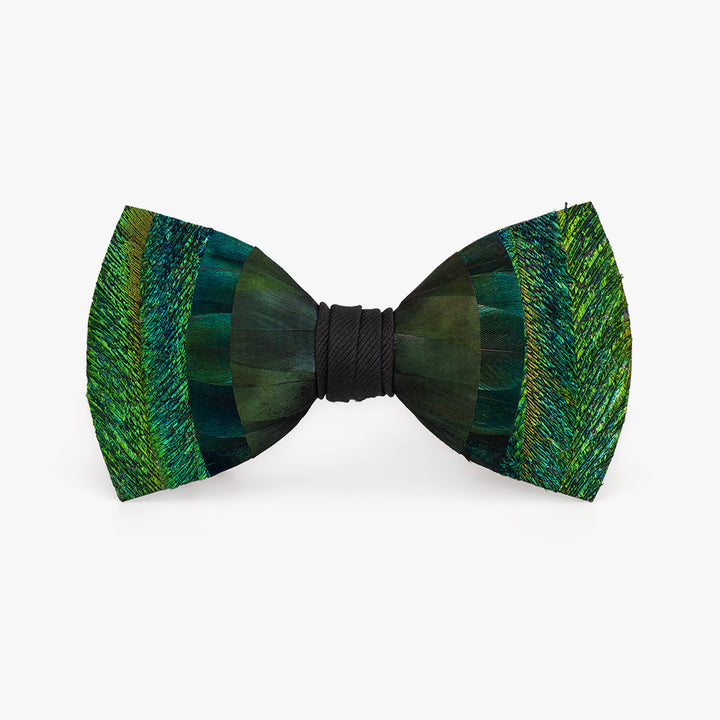 The Greene holiday bow tie, featuring rich layers of green peacock feathers with a lustrous sheen and deep black accents, tied together with a black grosgrain center, perfect for festive, formal gatherings.