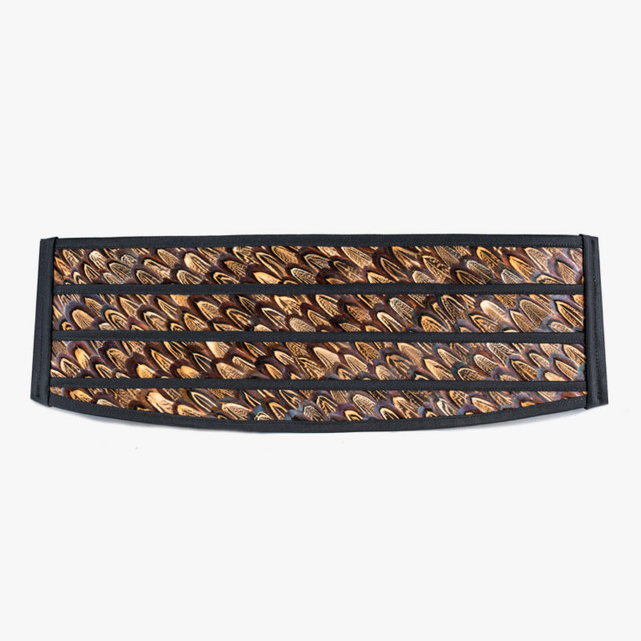 Handcrafted brown cummerbund adorned with natural pheasant feathers, featuring intricate patterns of rich earth tones and subtle iridescence, elegantly bordered with black trim.
